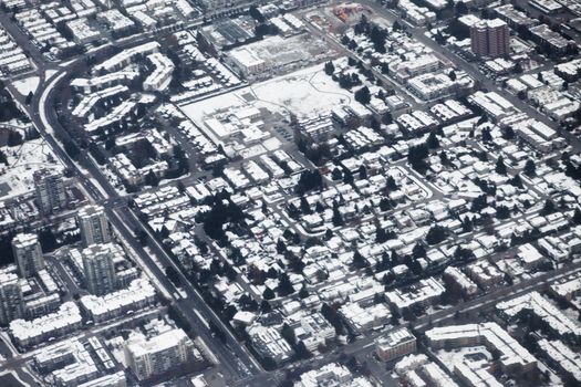 Aerial view of urbanization of lower mainland near Vancouver, British Colombia, Canada, in winter.