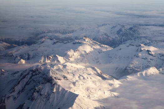 Snow covered moutain peaks perfect for heli-skiing in British Columbia, Canada.