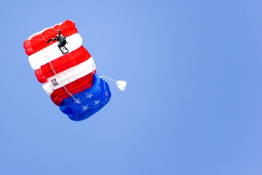 Image of a daring base jumper in action.