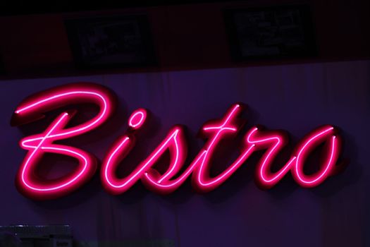 red luminous advertising of a bistro pub