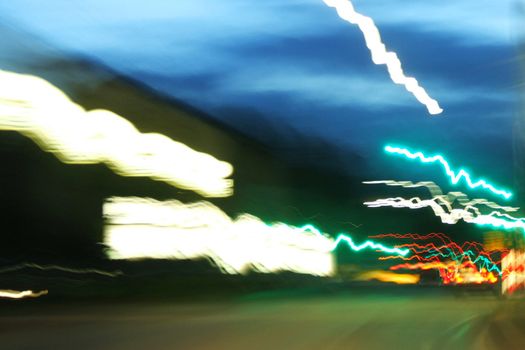 Lights in the road in the twilight of a long exposure time
