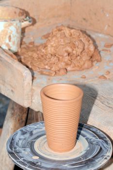 Loam pottery workshop at a market
