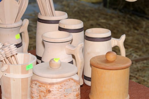 Wooden pots at the traditional street market
