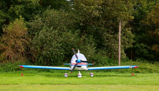 Small airplane parked and moored