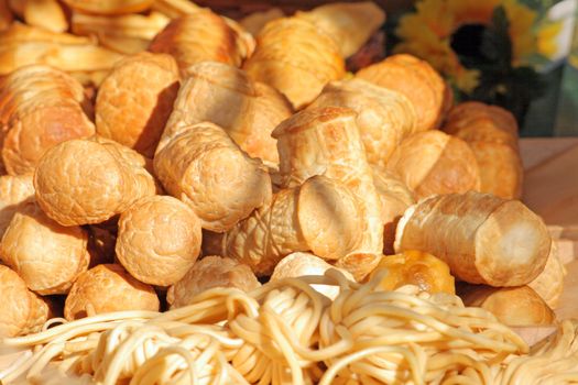 Traditional Polish smoked cheese known as oscypek at the market
