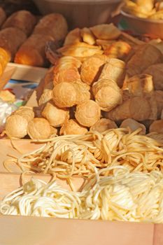 Traditional Polish smoked cheese known as oscypek at the market
