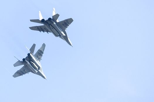 Image of a pair of Royal Malaysian Air Force F/A-18 Hornet jet fighters.