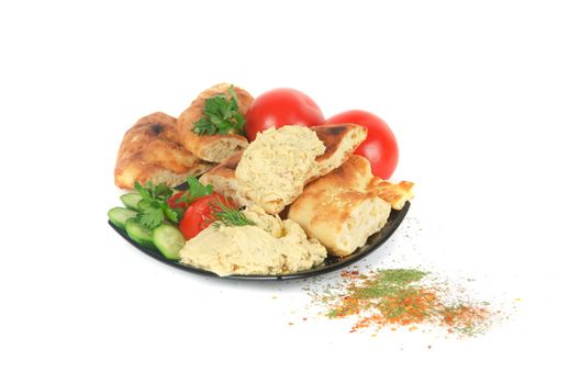 Bread with pate and fresh vegetables of tomatoes and cucumbers