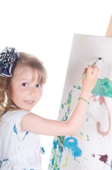 Shot of little girl painting in studio