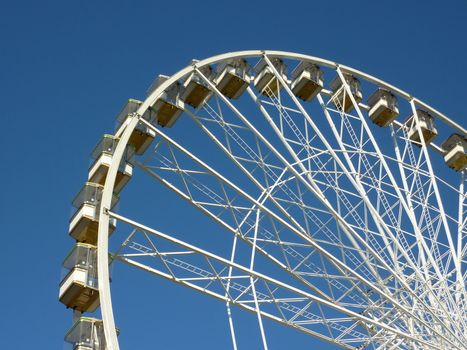 White wheel roundabout by beautiful weather and blue sky