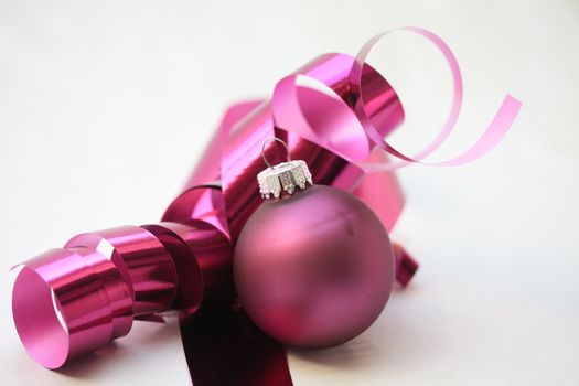 christmas ornament and purple ribbon