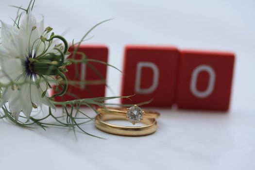 wedding set and letter spelling "I do"
