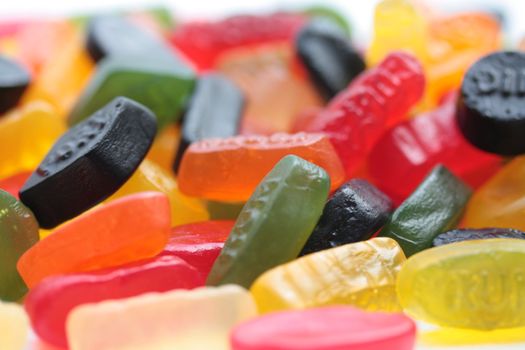 Pile of colorful candies: liquorice allsorts and wine gums
