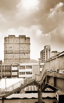 It is a beautiful cityscape contained flyover and apartment.