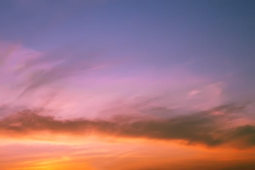 Multicolour clouds at sunset, fine summer evening