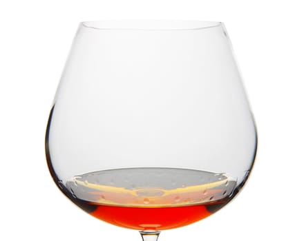 Cognac Snifter glass with liquid amber inside