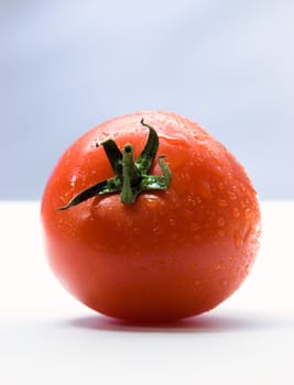 Tomato with drops.