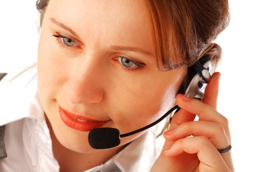 Closeup portrait of a yound beautiful call centre executive with headset, isolated over white background