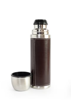 Modern steel thermos with leather armour. Isolated on white with clipping path