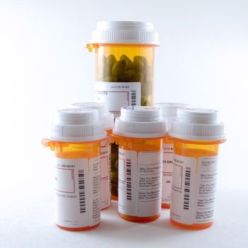 an image of a large number of prescription pill bottles.