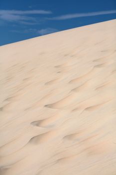 Sand dunes with a nice blue sky and white clouds! 