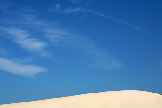 Sand dunes with a nice blue sky and white clouds! 