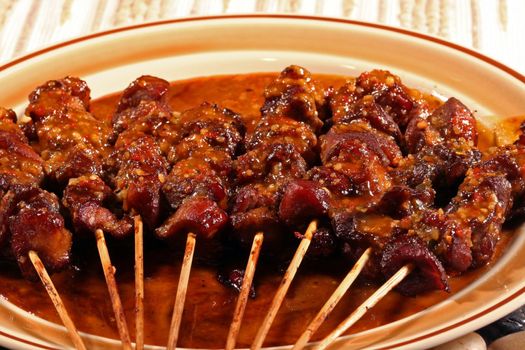 Pork satay on skewers