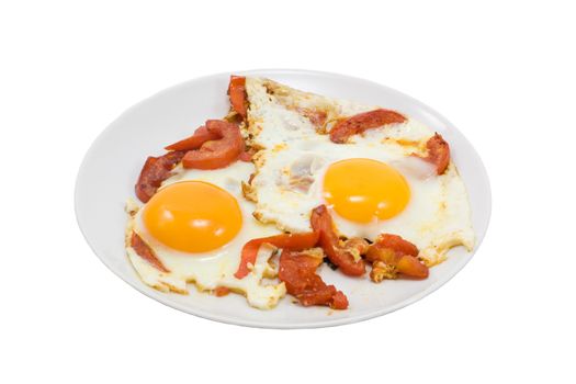 two fried eggs with tomatos on plate, isolated on white