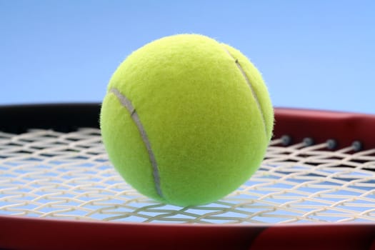 Tennis ball and tennis racquet