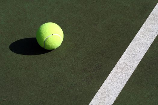 Tennis ball in tennis court