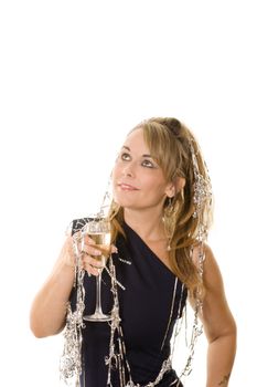 Attractive woman in party dress with wine and streamers isolated on white