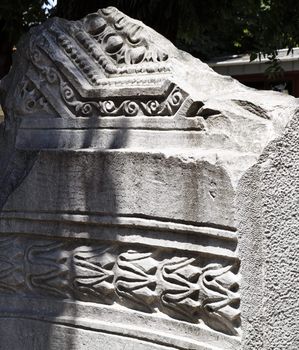 damaged, broken section of hand carved mineral rock display at Hagia Sofia Istanbul Turkey, portrait