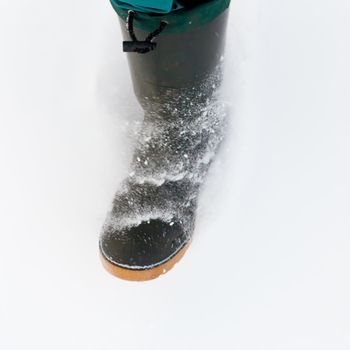 Walking through freshly fallen powder snow.