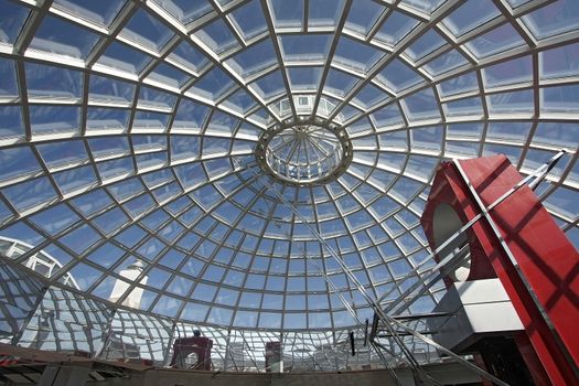 Fragment of a dome from glass and a steel in style hi-tech