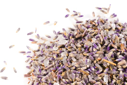 Lavender with a bit of bath salts close up, isolated on a white background.