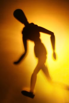 blurry silhouette of a figure in motion