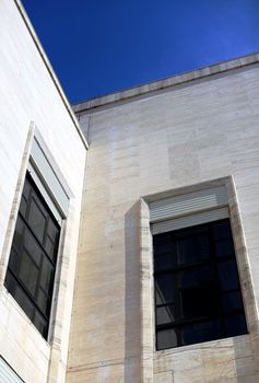 Windows on white building