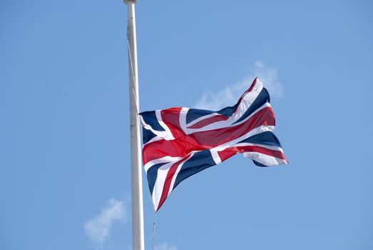 A British Union Jack Flag flying in a breeze