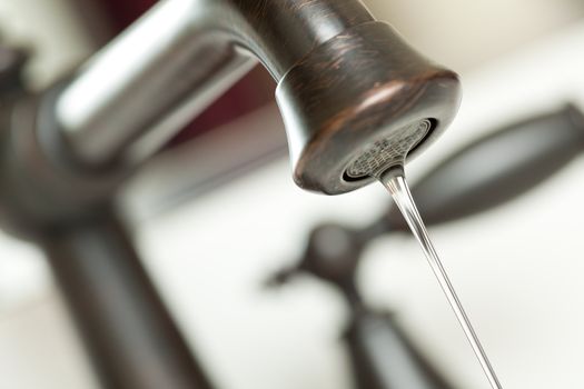 Close-up of Water Dripping from Water Faucet