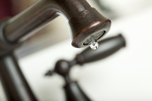 Close-up of Water Dripping from Water Faucet