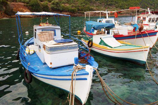 Picture of moored fishing boats in an idyllic bay