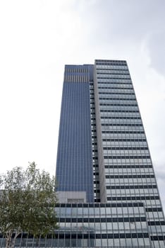 Two Glaa and Blue Tile Skyscraper Office Blocks