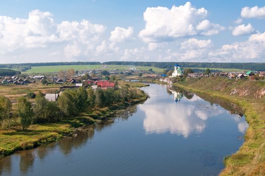 Panoramic landscape of russian village on the river