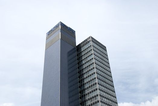Two Skyscraper Offices under a summer sky