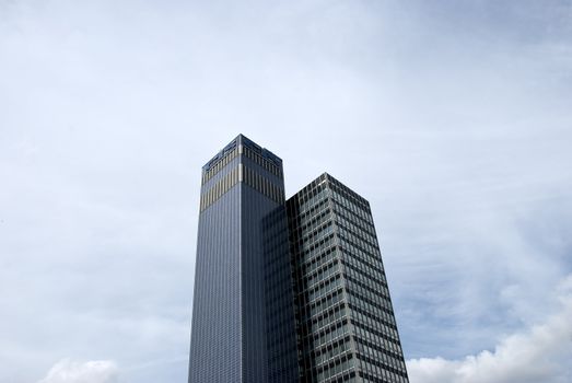 Two Skyscraper Offices under a summer sky
