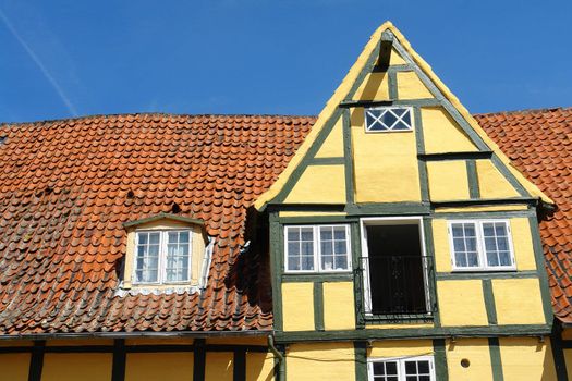 Facade of traditional old classic decorative style Danish country house home Denmark                               