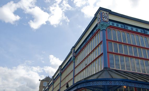 The Ornate Brightly Coloured Cast Iron Facade of a Victorian Era Market Hall
