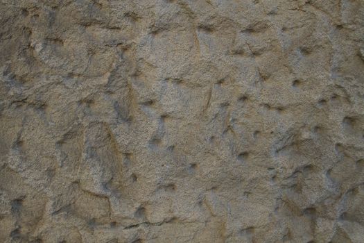 background or texture of a jagged sandstone wall