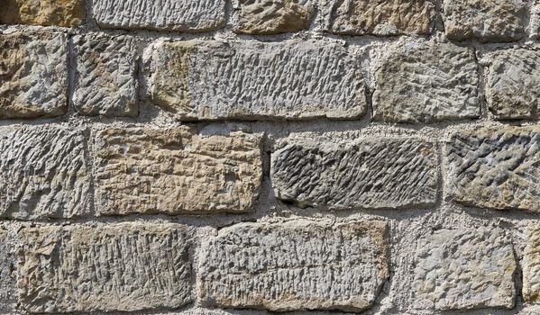 background or texture of a massive stone wall