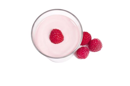 raspberry on top of a milkshake with rapsberries aside from top on white background